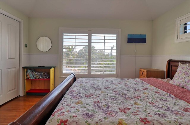 bedroom featuring dark wood-type flooring