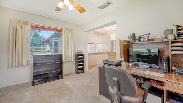 carpeted home office with ceiling fan