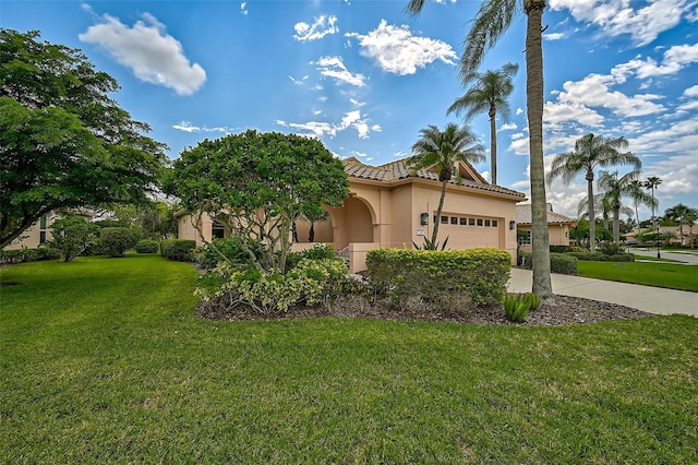 view of home's exterior featuring a garage and a lawn