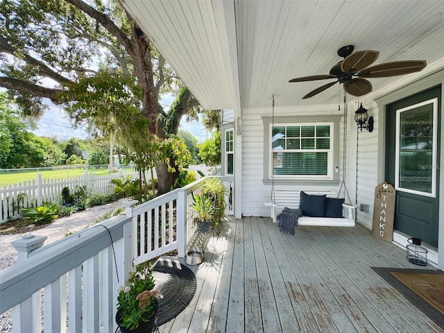 wooden deck with ceiling fan