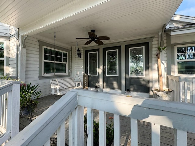 deck featuring ceiling fan and covered porch