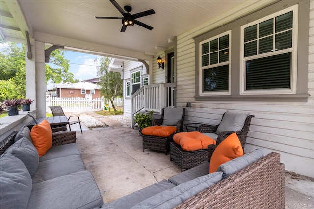 view of patio with ceiling fan and outdoor lounge area