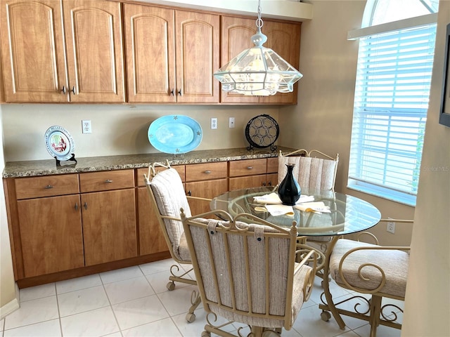 dining room with light tile patterned floors