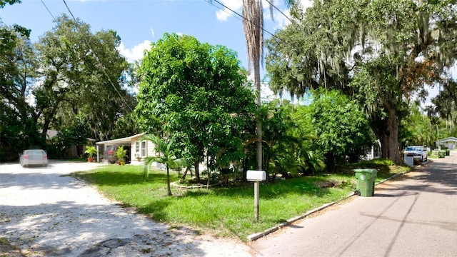 1820 7th Ave E, Bradenton, FL 34208 - surrounding community with a lawn