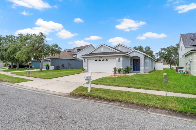 single story home featuring a garage, a front lawn, and central AC