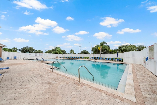 view of pool featuring a patio area