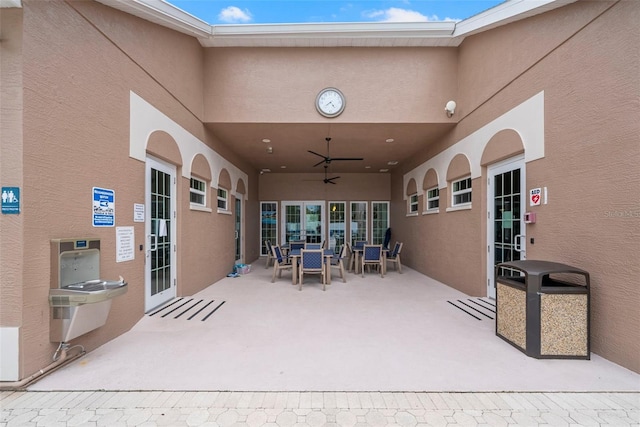 view of patio / terrace with ceiling fan and french doors