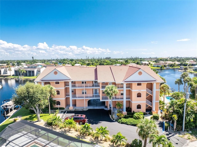 drone / aerial view featuring a water view