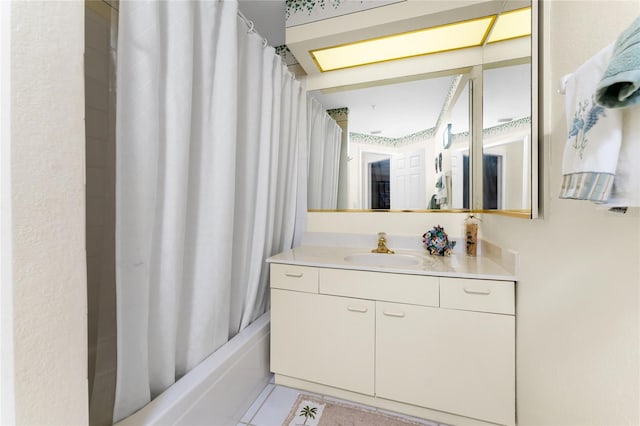 bathroom featuring shower / bath combo, vanity, and tile patterned floors