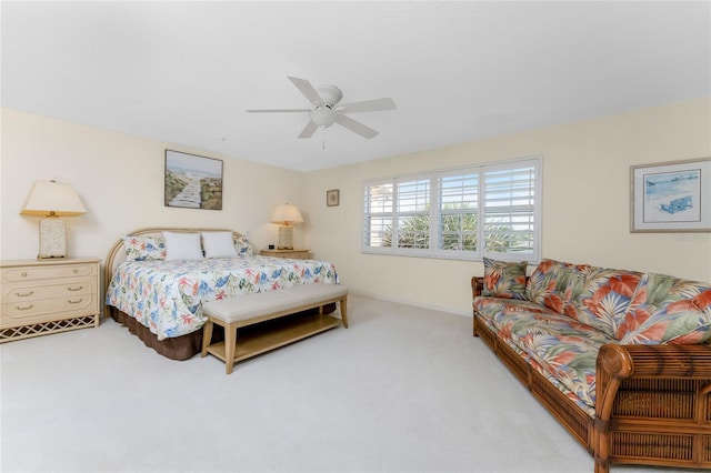 bedroom with ceiling fan and carpet