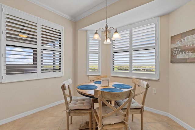 dining space featuring an inviting chandelier, crown molding, and light tile patterned floors