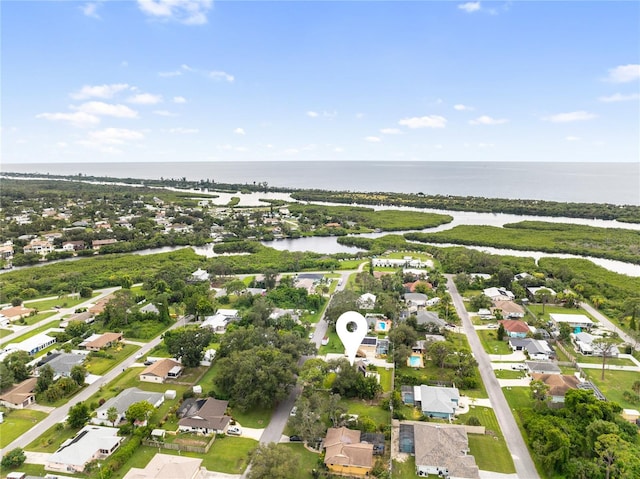 bird's eye view with a water view