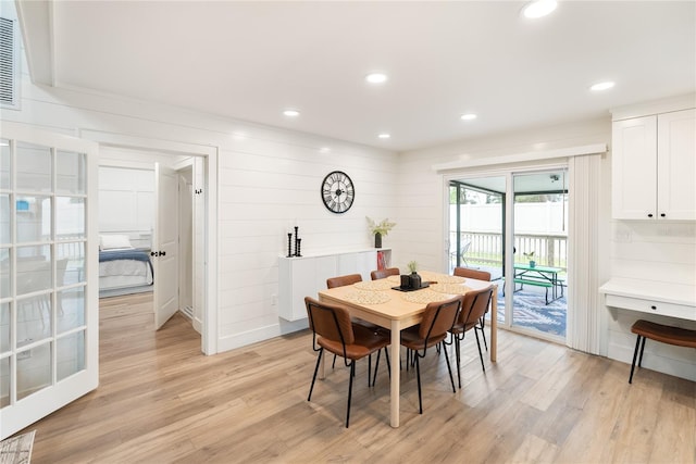 dining space with light wood-type flooring