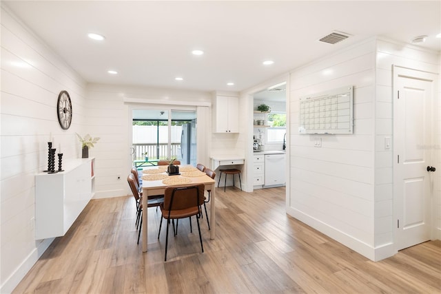 dining area featuring light hardwood / wood-style floors