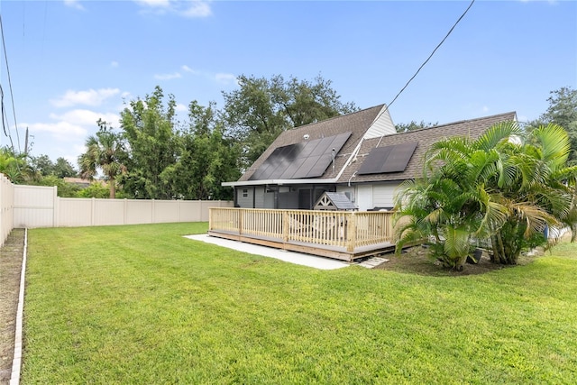 view of yard with a deck