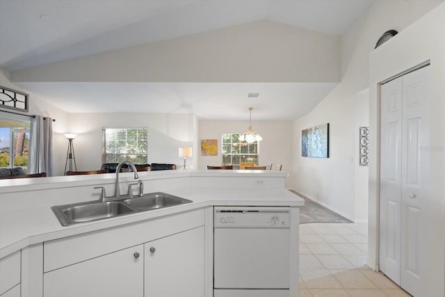 kitchen featuring sink, white dishwasher, and a wealth of natural light