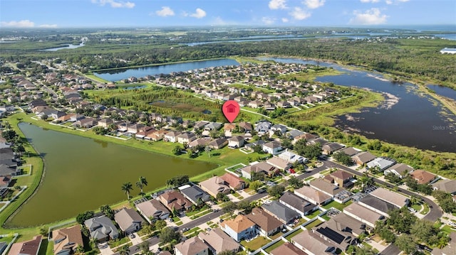 bird's eye view with a water view