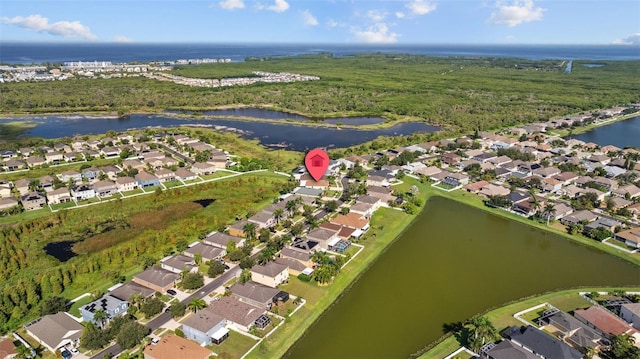 bird's eye view with a water view