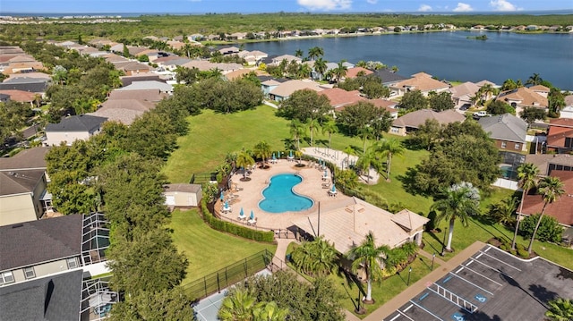 birds eye view of property with a water view