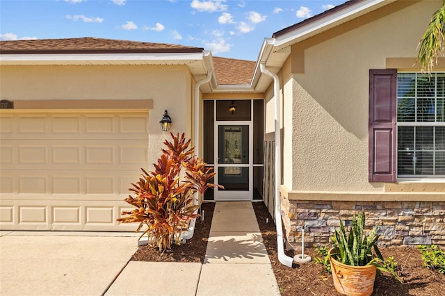 property entrance with a garage