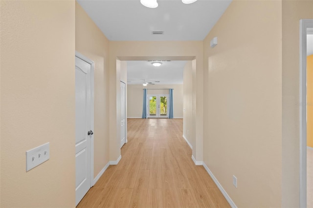 hallway featuring light hardwood / wood-style flooring