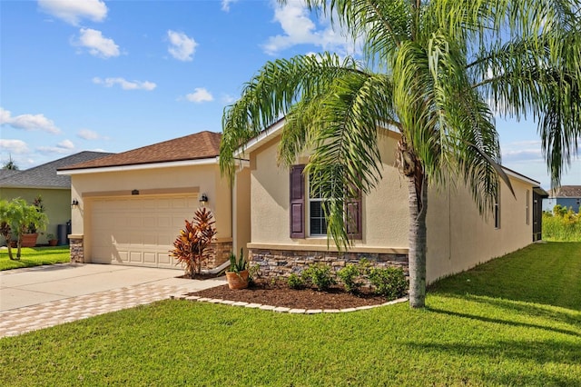 view of front facade with a garage and a front yard