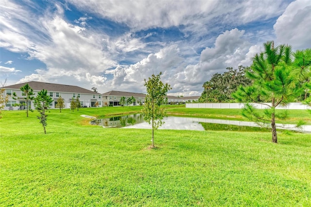 view of yard with a water view