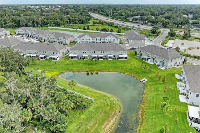 drone / aerial view with a water view