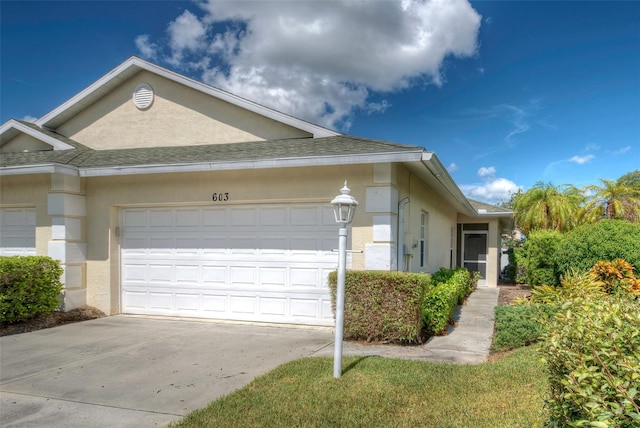 view of front of house with a garage