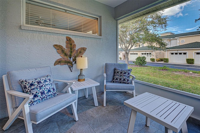 view of patio / terrace featuring a garage