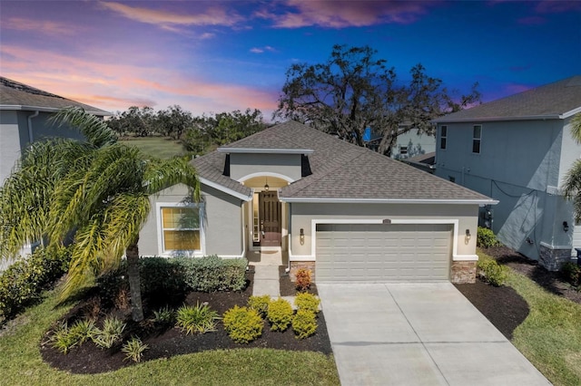 view of front of home featuring a garage