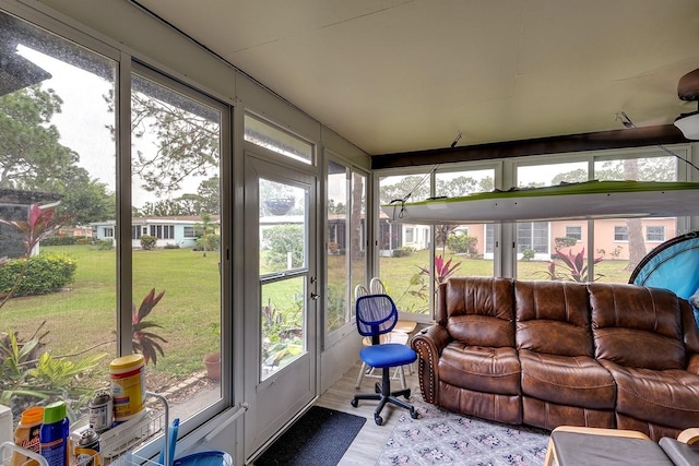 sunroom featuring a healthy amount of sunlight