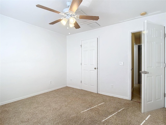 unfurnished bedroom with ceiling fan and carpet flooring