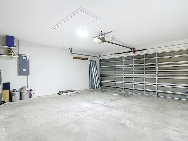 garage with a garage door opener and electric panel