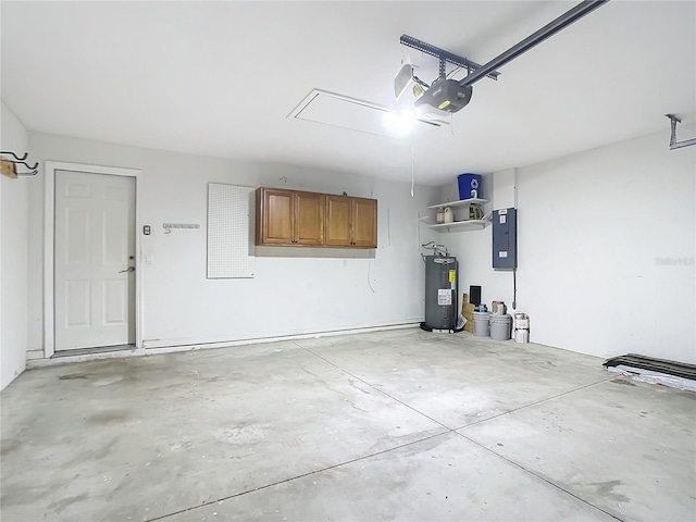 garage featuring a garage door opener, electric water heater, and electric panel