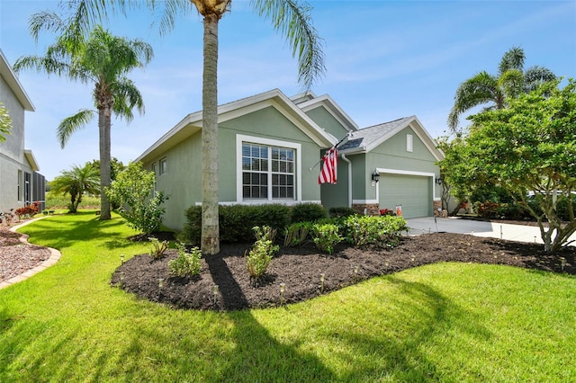 view of home's exterior with a garage and a yard