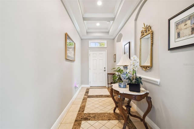 doorway to outside featuring crown molding, a tray ceiling, and light tile patterned floors