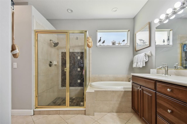 bathroom featuring vanity, separate shower and tub, and tile patterned flooring