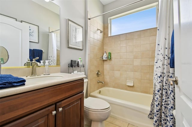 full bathroom with vanity, tile patterned flooring, toilet, and shower / bath combo