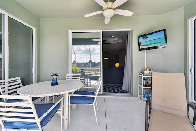 dining room featuring ceiling fan