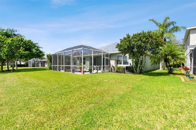 view of yard with a lanai