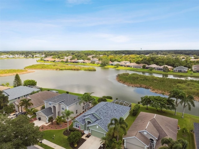 birds eye view of property featuring a water view