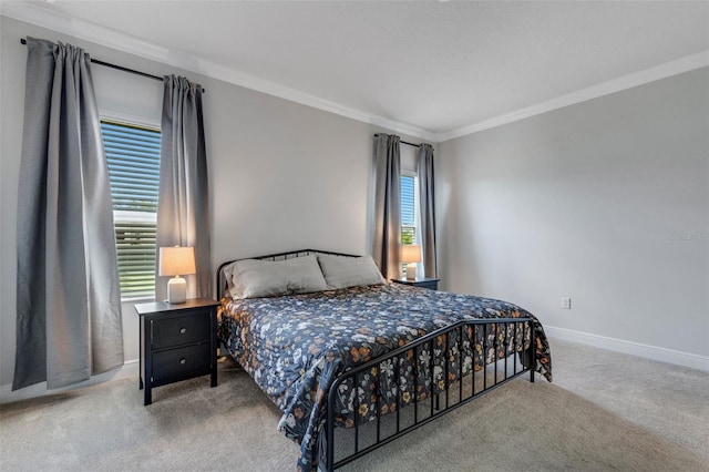 carpeted bedroom with crown molding