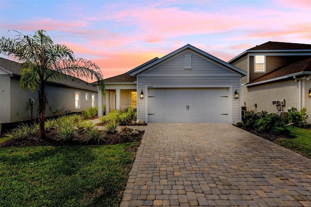 view of front of home with a garage