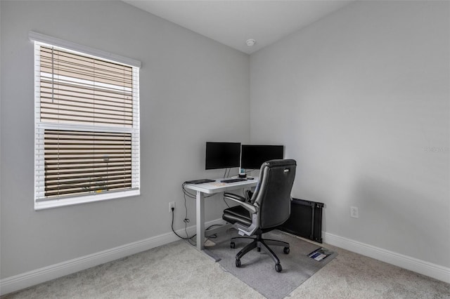 office space with a wealth of natural light and carpet