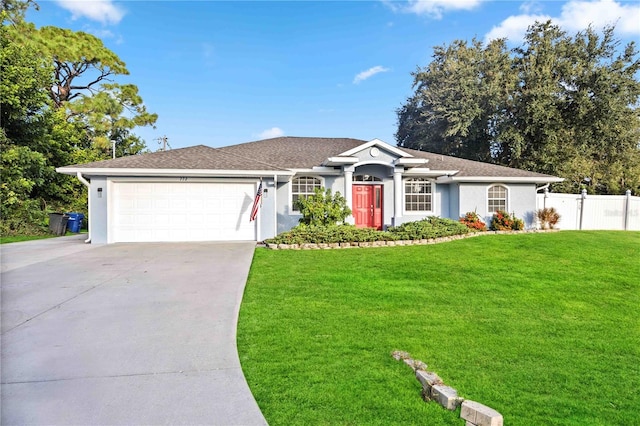 single story home featuring a front yard and a garage