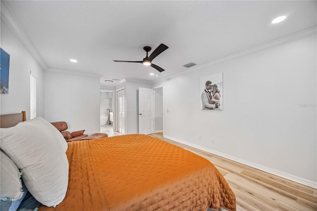 bedroom with wood-type flooring, ceiling fan, ensuite bathroom, and crown molding