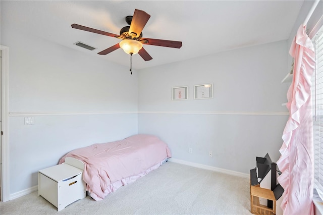 carpeted bedroom featuring ceiling fan