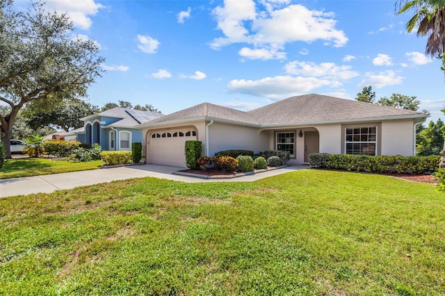 ranch-style home featuring a garage and a front lawn