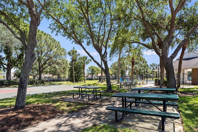 view of property's community featuring basketball hoop